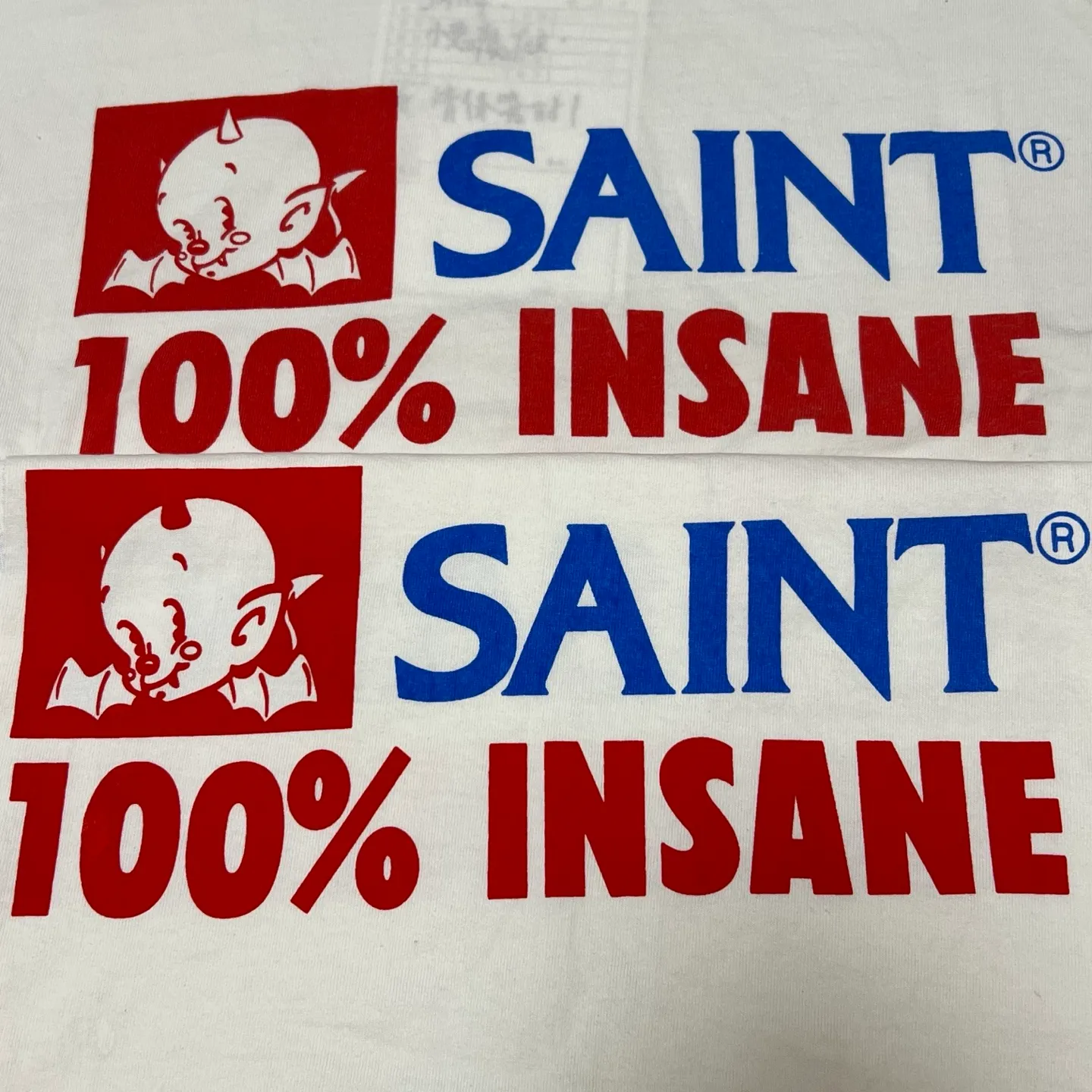 Printing proofing comparison SAINT Mxxxxxx INSANE SS TEE/WHT Little Devil Angel TEE 100% INSANE slogan printed short sleeves Off-white S-XL Tube weaving without side seam fabric OE yarn Original same weight Correct version Original main mark/wash mark/little angel security code Original development No touch printing